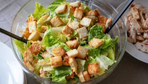 bowl of homemade cesar salad with grilled chicken
