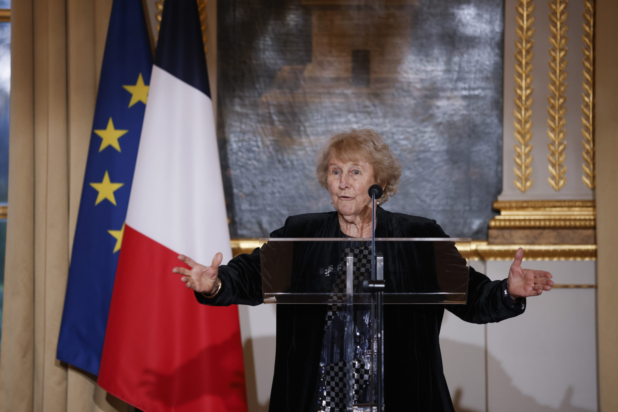 Canadian novelist Antonine Maillet delivers a speech before being awarded with the Legion of Honor by French President Emmanuel Macron at the Elysee Palace in Paris, Wednesday, Nov. 24 , 2021. (Yoan Valat/Pool Photo via AP)